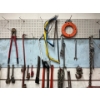 Image 3 : Massive Selection Of Tools Hanging on The Wall . Pipe Wrenches Jackall Saws Extension Cords Wrenches