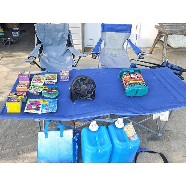 Outdoor Camping Lot With Cot, Folding Chairs, Bird Feeder, Fan, and Accessories