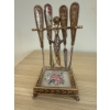 Image 1 : Vintage Gilt Metal Manicure Set with Floral Handles and Needlepoint Base
