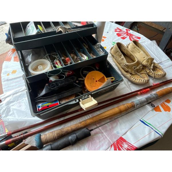 antique bamboo fishing rod with pair of leather moccasins and a tackle box with contents