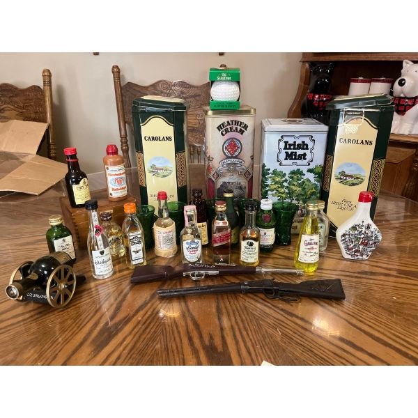 Collection of vintage mini bottles with Irish cream tins