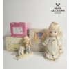Image 2 :  several Precious Moments figurines and a doll, 