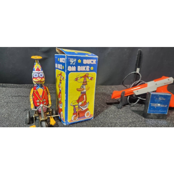 Duck on Bike Tin Toy with Box and Nintendo NES Zapper with Thundervision Game Cartridge