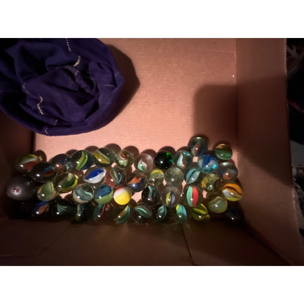  Large vintage marbles total of 41 and a vintage Seagrams purple bag several great designs for those