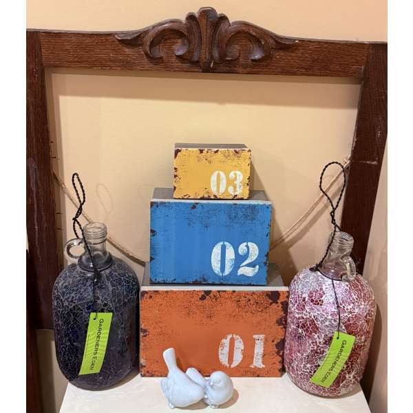 Decorative Items Grouping Including Ceramic Birds, Mosaic Bottles, Stacking Boxes, and Wood