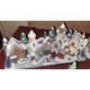 Image 3 : Holiday Homes: Christmas Villages (One Steeple Broken but Attached) and Carolers 