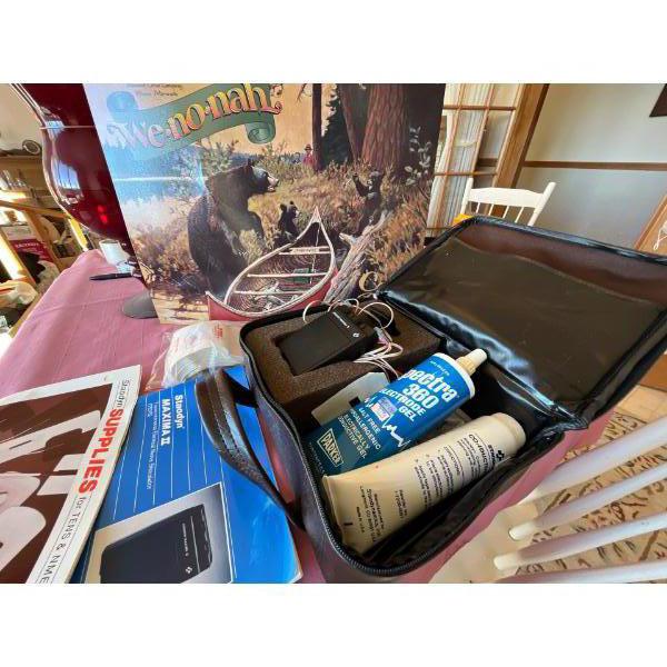 We-no-nah vintage sign and a STEODYN Maxima, two nerve stimulator