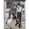 Image 3 : Black-and-White Hockey-Themed Film Stills on Display Boards
