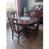Image 1 : Antique Pedestal Round Table c. 1910, with 7 chairs, a Captain’s chair and 3
leaves
? Feet compatibl
