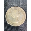 Image 2 : 1958 Canada Silver Dollar Featuring Queen Elizabeth II and Voyageur Design