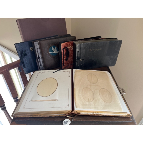 collection of antique photo albums most are all leather bound in a book by Guy COHELEACH the big cat