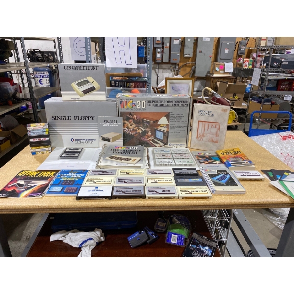 vic 20 with floppy disk and cassette, cartridges, manuals