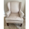 Image 1 : Wingback Armchair With Neutral Upholstery and Wood Legs
