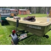 Image 8 :  Sundolphin, 12 foot hard plastic boat with trailer seats, lifejackets motor and gas can.
Johnson se