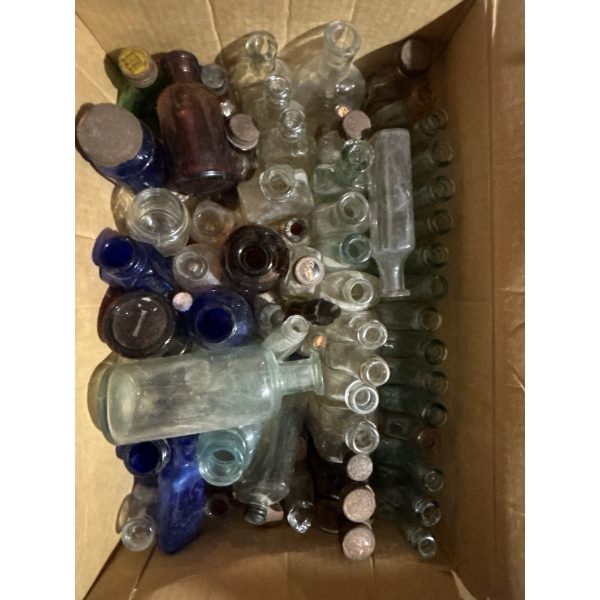 collection of Small Embossed antique medicine bottles un researched blue Amber clear dating back to 