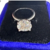 Image 2 : 5ct GRA Certified Round Brilliant Cut Moissanite with 14 Round Cut CZ's set in 925 Silver Ring