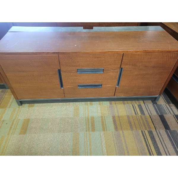 Brown Three Drawer Dresser with Metal Accents and Storage Compartments