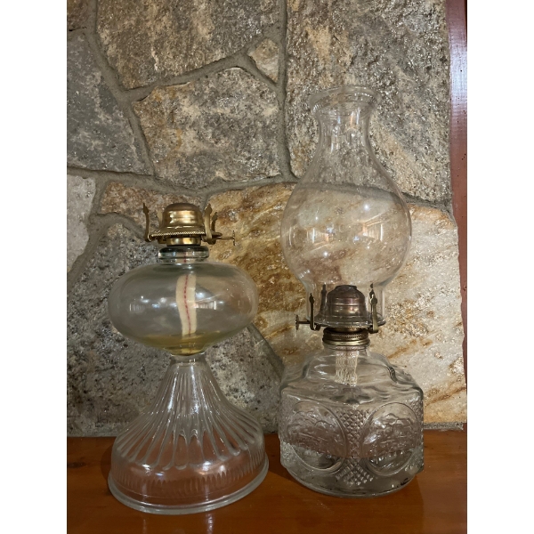 2 antique oil lamps? One with glass and one without very unique design basis.