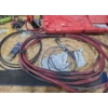 Image 7 : Milwaukee Cordless Grease Gun, Motomaster Charger, Hoist Chains and Shop Table