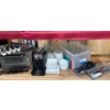 Image 1 : Kitchen Essentials Including Oven, Dishware, and Utensils