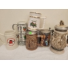 Image 1 : Six Ceramic and Stoneware Beer Steins and Tankards with Varied Designs
