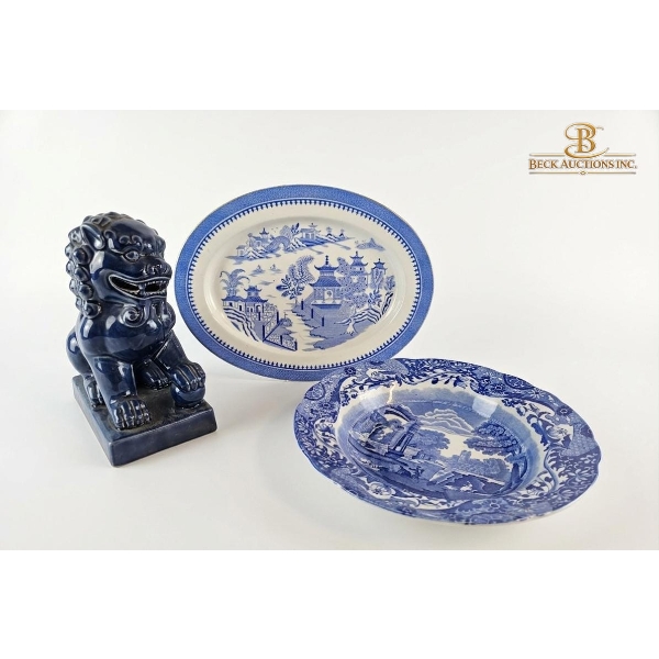 Collection Of Vintage Blue Willow Pattern Chinaware Alongside A Blue Ceramic Foo Dog Figurine.