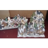 Image 1 : Holiday Homes: Christmas Villages (One Steeple Broken but Attached) and Carolers 
