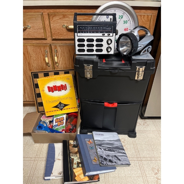 Rolling tool box with various games vintage radio, flashlight thermometer