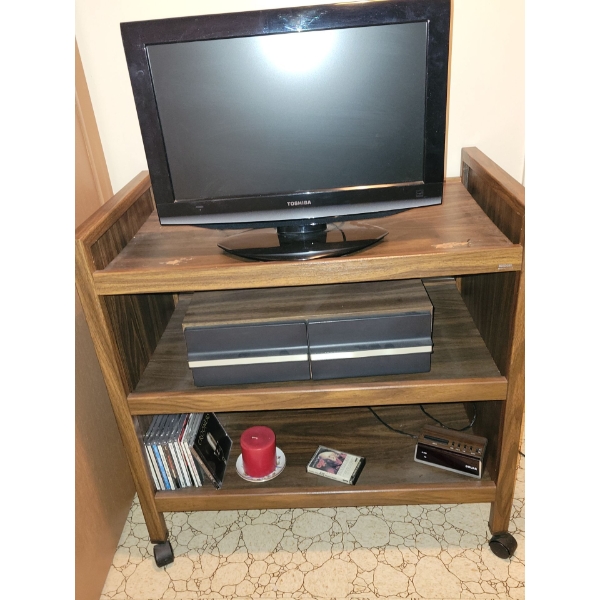 18" Toshiba Flat Screen Television w Assorted CDs Vintage Alarm Clock & TV Table