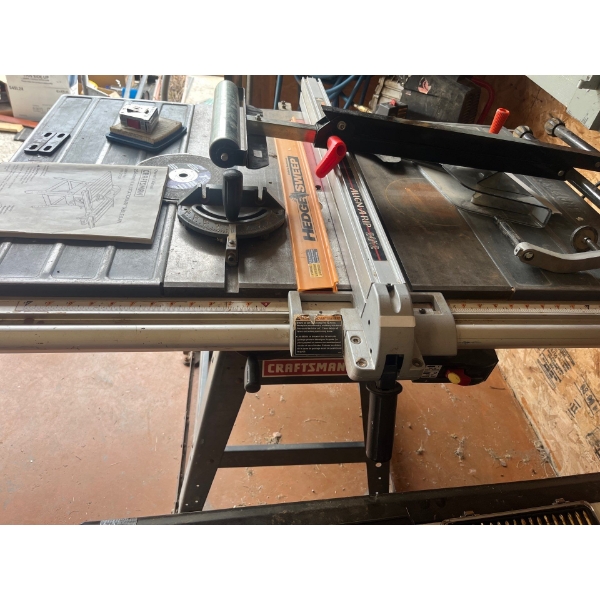 Craftsman 254 mm Stationary Saw with extra blades and rolling extendable saw horse . With rolling st
