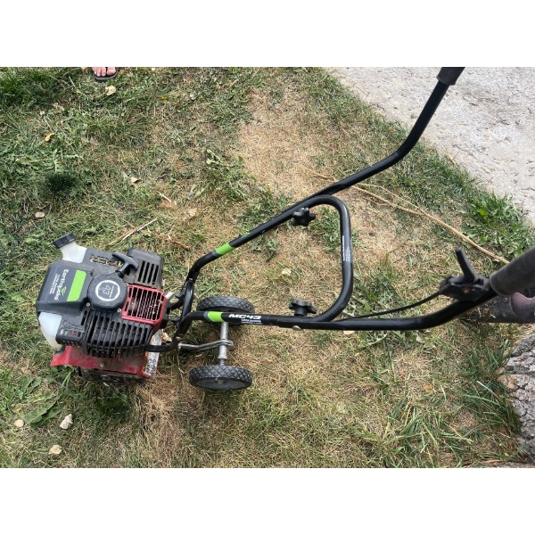 Small garden Rototiller made by earthquake with two cycle 43 cc engine