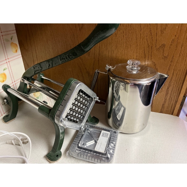 Vintage  cast-iron French fry cutter with attachments and a vintage percolator coffee pot
