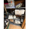 Image 2 : Two metal shelves with contents, kitchen supplies, vacuum several small bins, enamel cookware, kids,