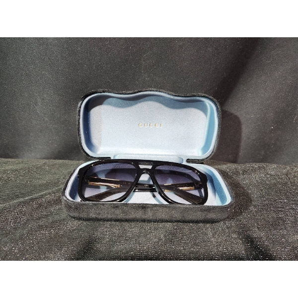 Gucci GG1188S 002 Black Sunglasses with Gold Detailing and Original Case