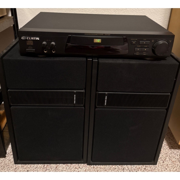 Curtis VCD/SVD/DVD/CD/MP3 Player w/ Speakers 