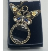 Image 3 : Butterfly Magnifying Glass Necklace With A Vintage Inspired Amber Bracelet