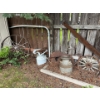 Image 1 : All backyard, decorations, saw blades, saws, antique milk, jugs, wagon, wheels, and another decorati