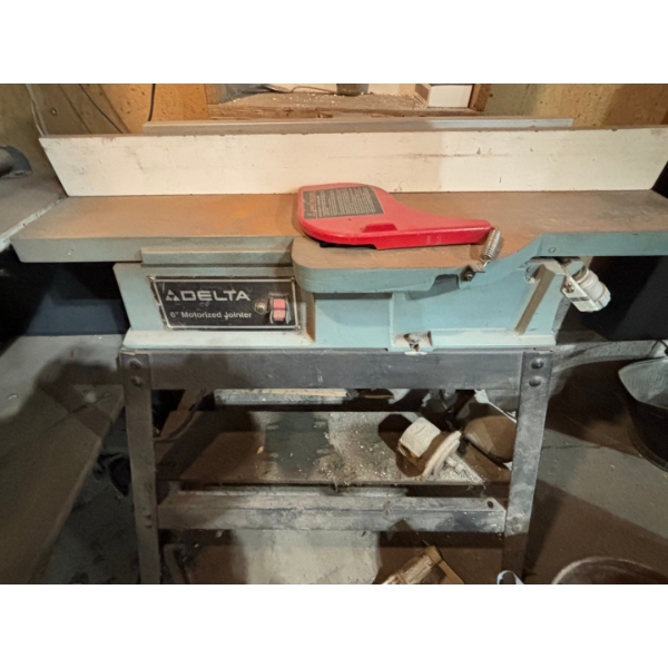 Delta 6 inch motorized jointer on Stan in working condition