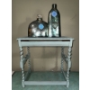 Image 1 : Decorative Glass Bottles and Light Blue Painted Table