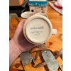 Image 2 : vintage ceramic souvenir mug featuring a blue indented design of the Calgary skyline and mountains, 