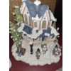 Image 5 : Holiday Homes: Christmas Villages (One Steeple Broken but Attached) and Carolers 