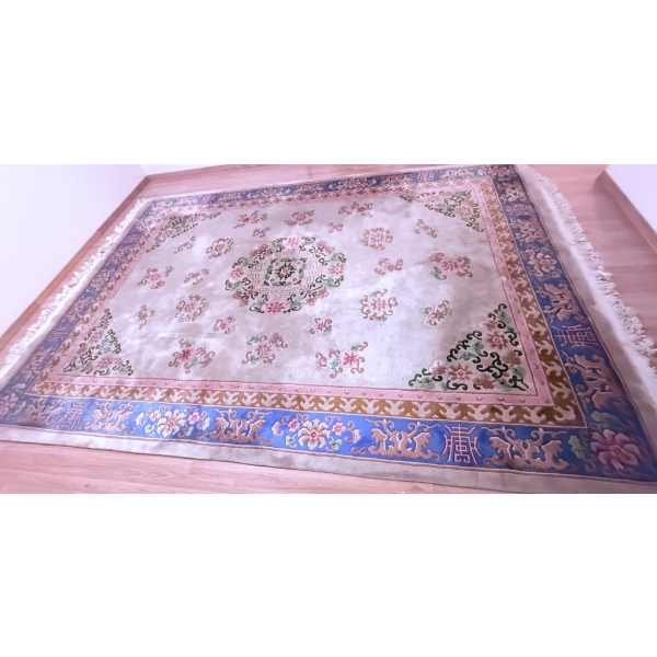 Large Area Rug with Floral Patterns and Decorative Borders