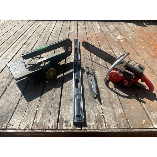 4 Foot Level, Dremel Table Saw, Craftsman Chainsaw, Hunting Knife.
