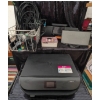 Image 1 : Electronic Devices with Assorted Cables, Including HP Printer, Canon Printer, and Bose Sound Systems