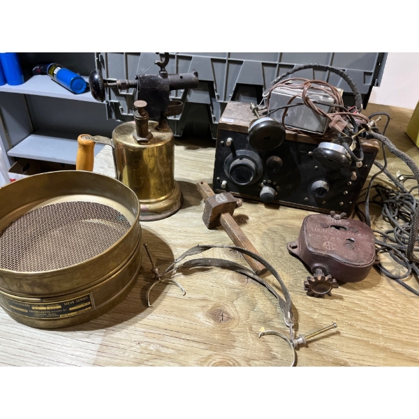 Antique ham radio, antique brass flamethrower and cyton service series US standard