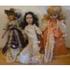Image 1 : Porcelain Dolls: Girl in Dresses. Tallest is 18T 