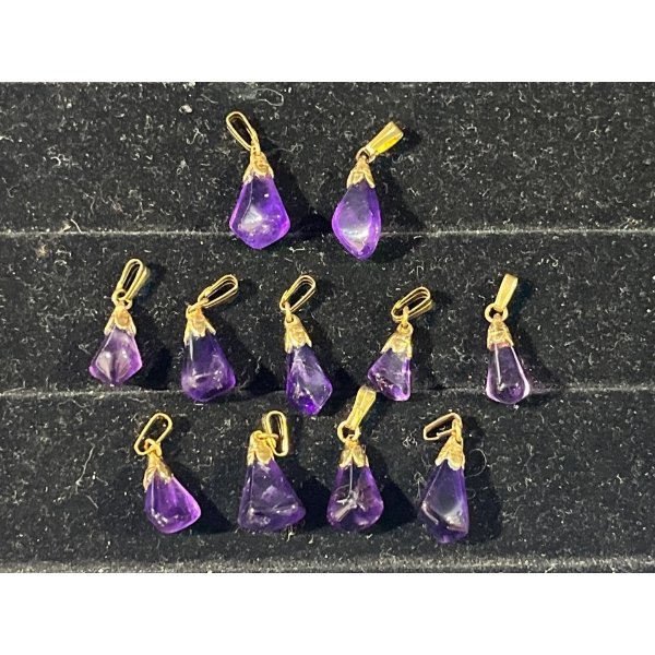 Collection of 11 Purple Stone Pendants