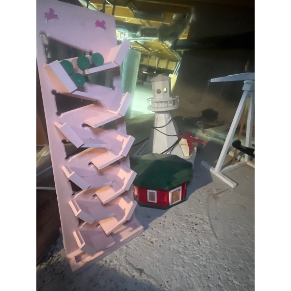 amazing handcrafted, lighthouses that plug-in, a manual, spinning airplane fair ride and plug-in car