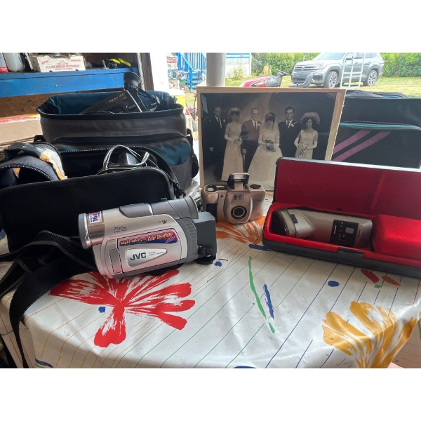 2 JVC VHS, recorders with chargers, a Phillips vintage razor with charger and a digital camera inclu