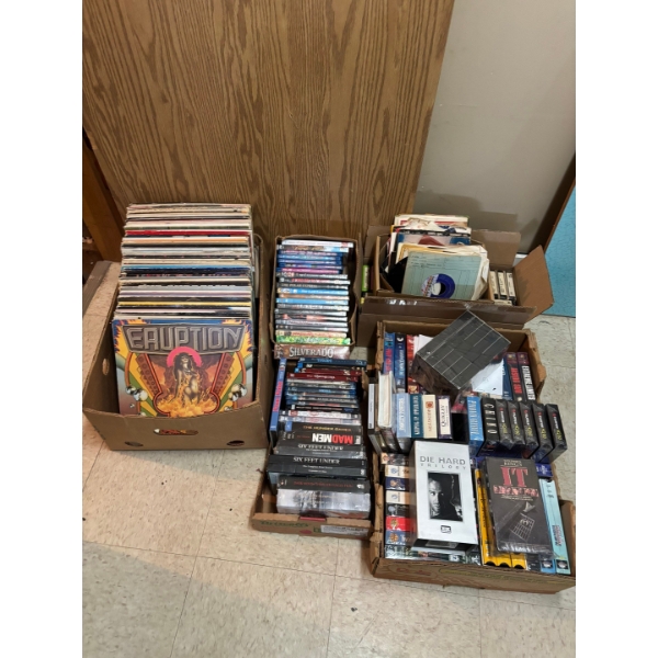 large collection of records, DVDs VHS a tracks from all errors, genres lots of cool old school movie